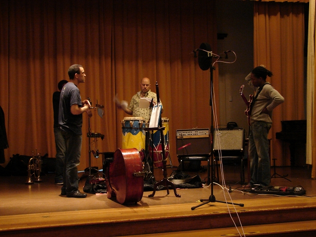 Markus goes over some last minute notes with the band